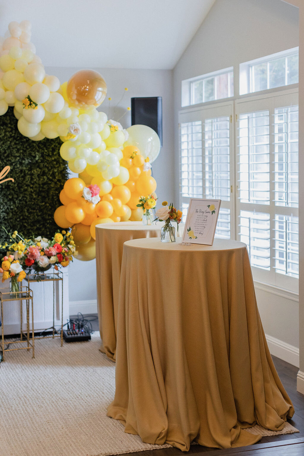 mustard, shades of yellow, balloons, cocktail tables, bud vases