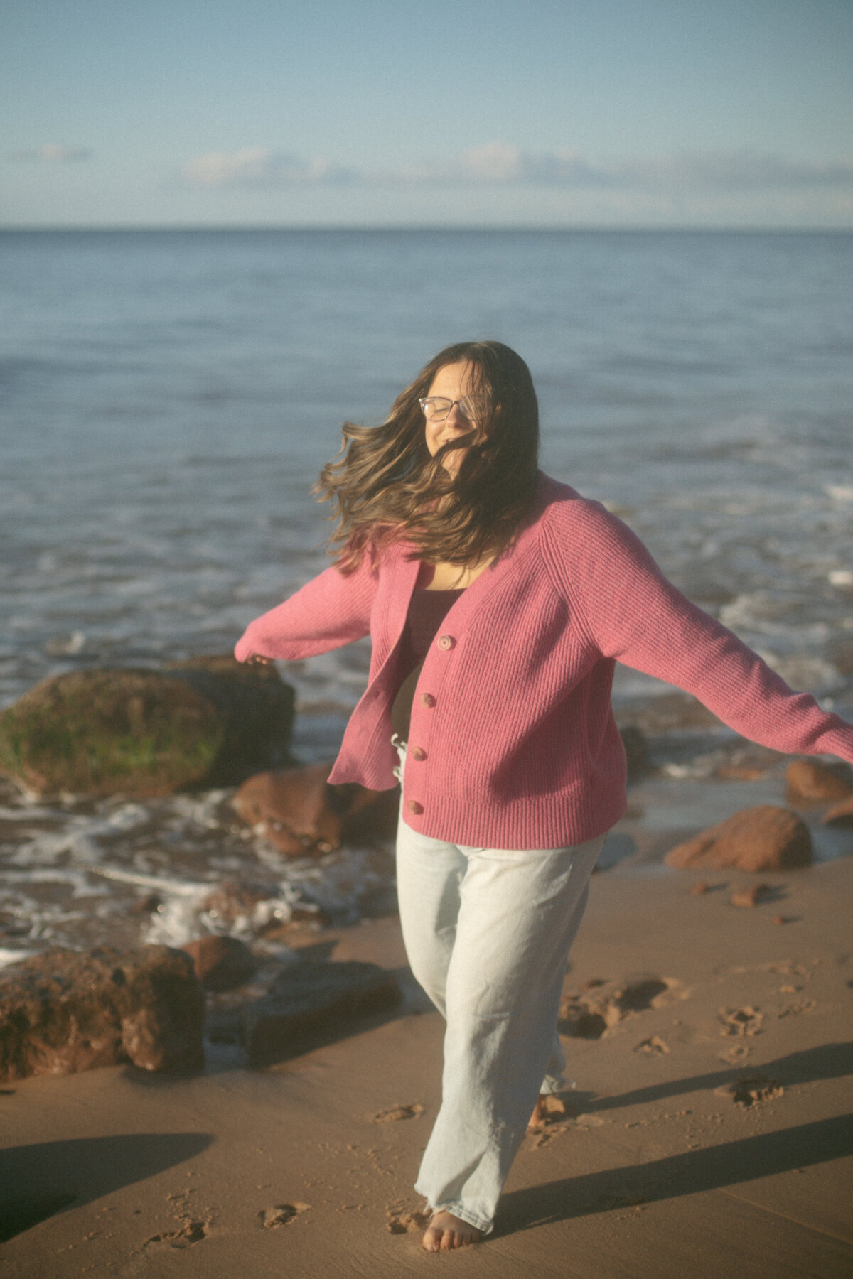 london ontario wedding photographer walking on the beach