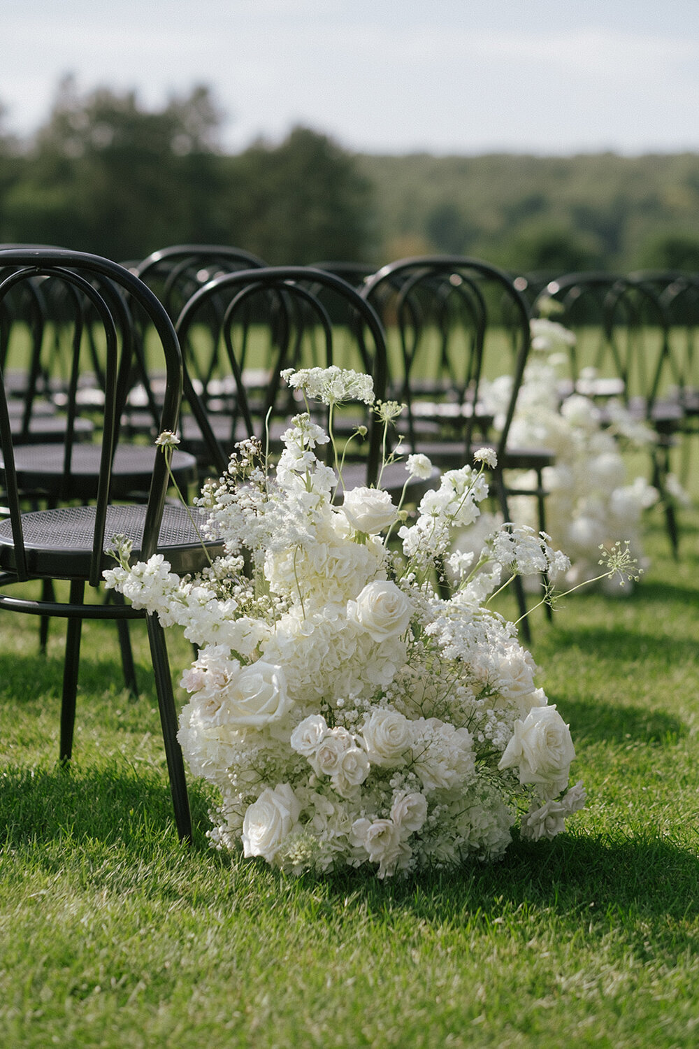 elegant-wedding-ceremony-decor-white-floral-aisle