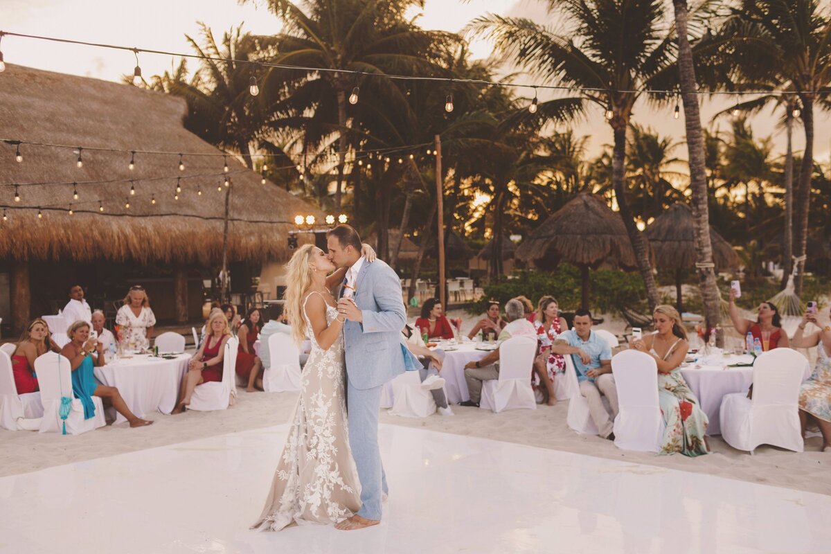 Bride and grooms first dance on the beach at wedding in Cancun