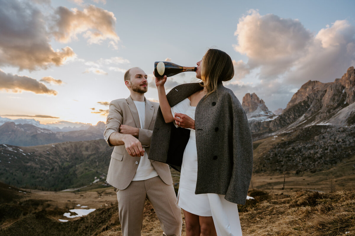 romantic couple during twilight elopement in Dolomites