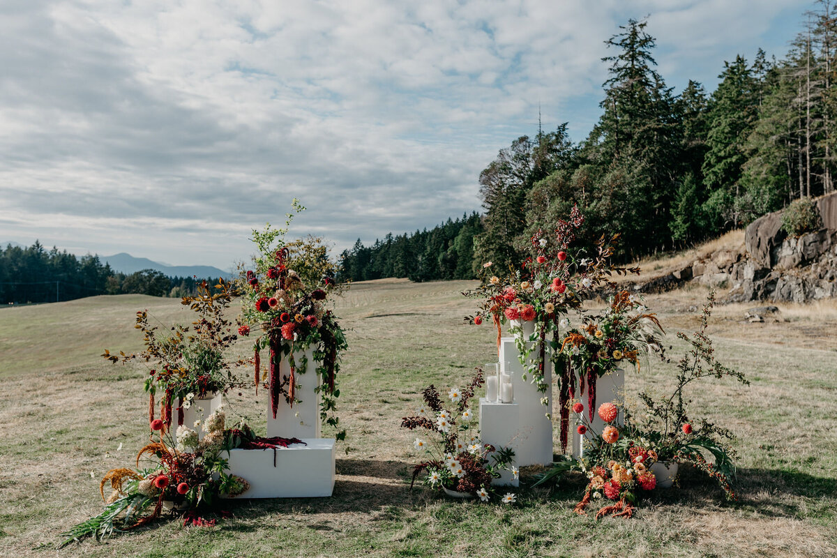 A set of colourful wedding floral arrangements for a beach wedding ceremony on Salt Spring Island. 