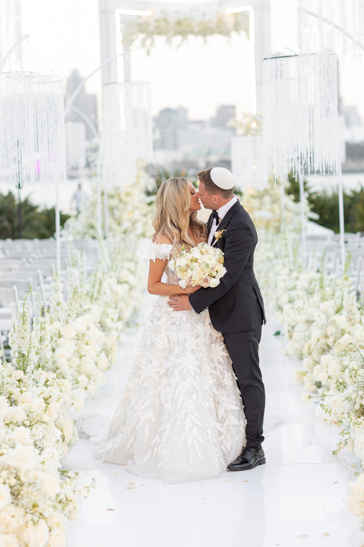 A bride and groom about to kiss