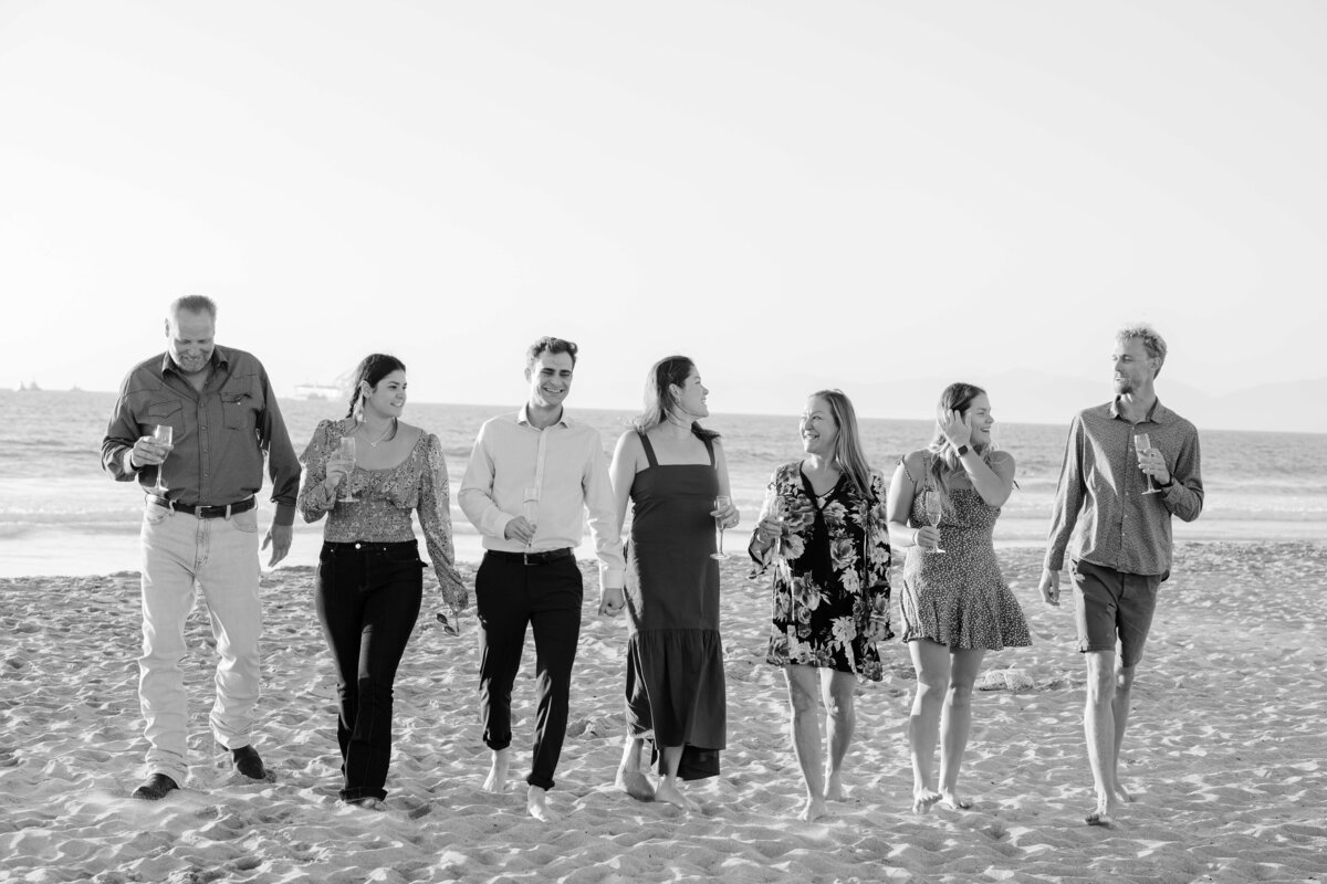 Family members at an LA beach proposal