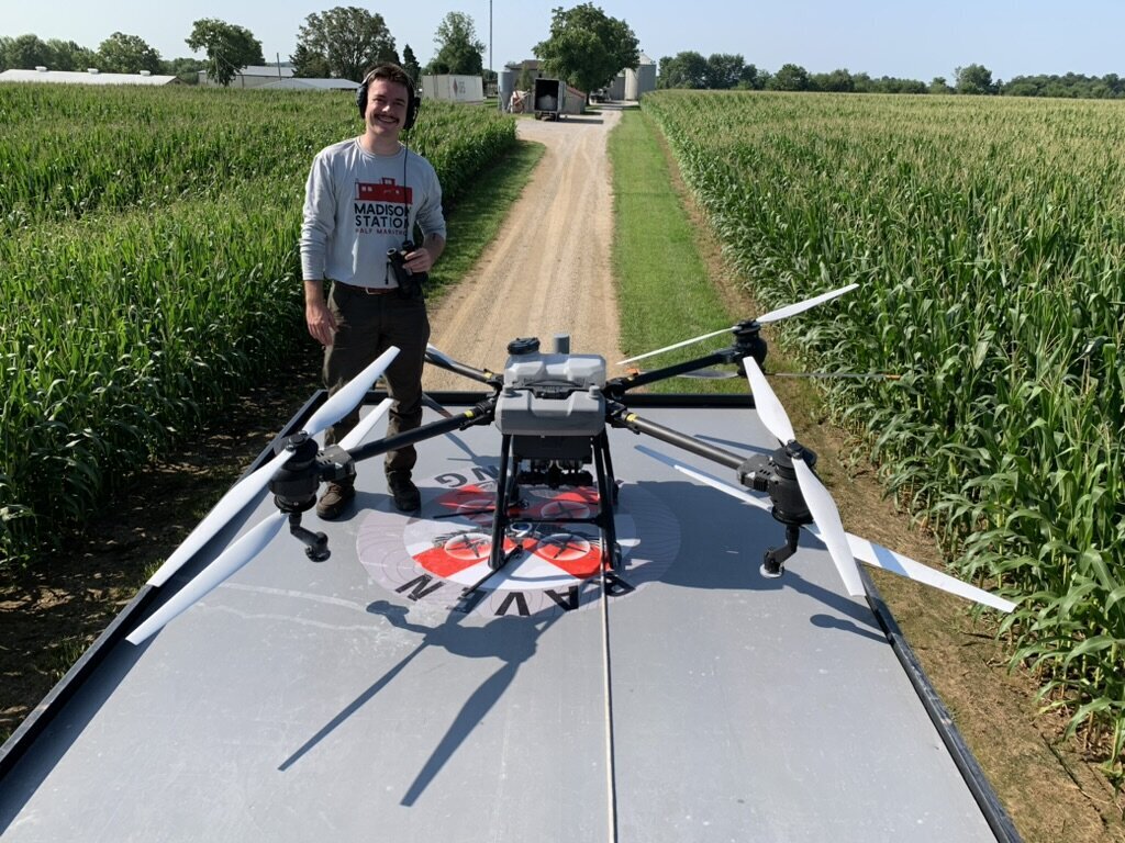 Raven 6 Rising pilot Brack Randolph preparing the DJI Agras T-40