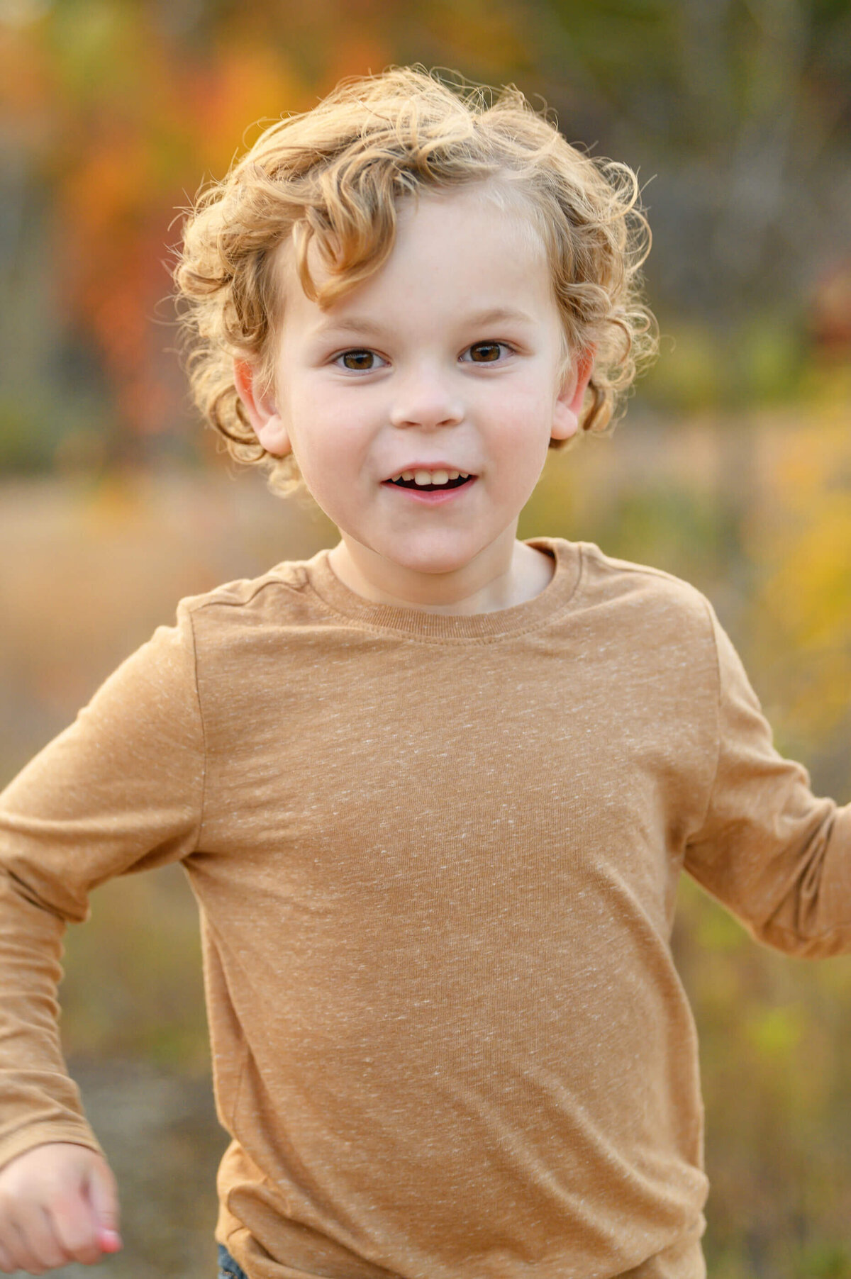 Up close photo of a little boy for his fall family photos in Burlington, On