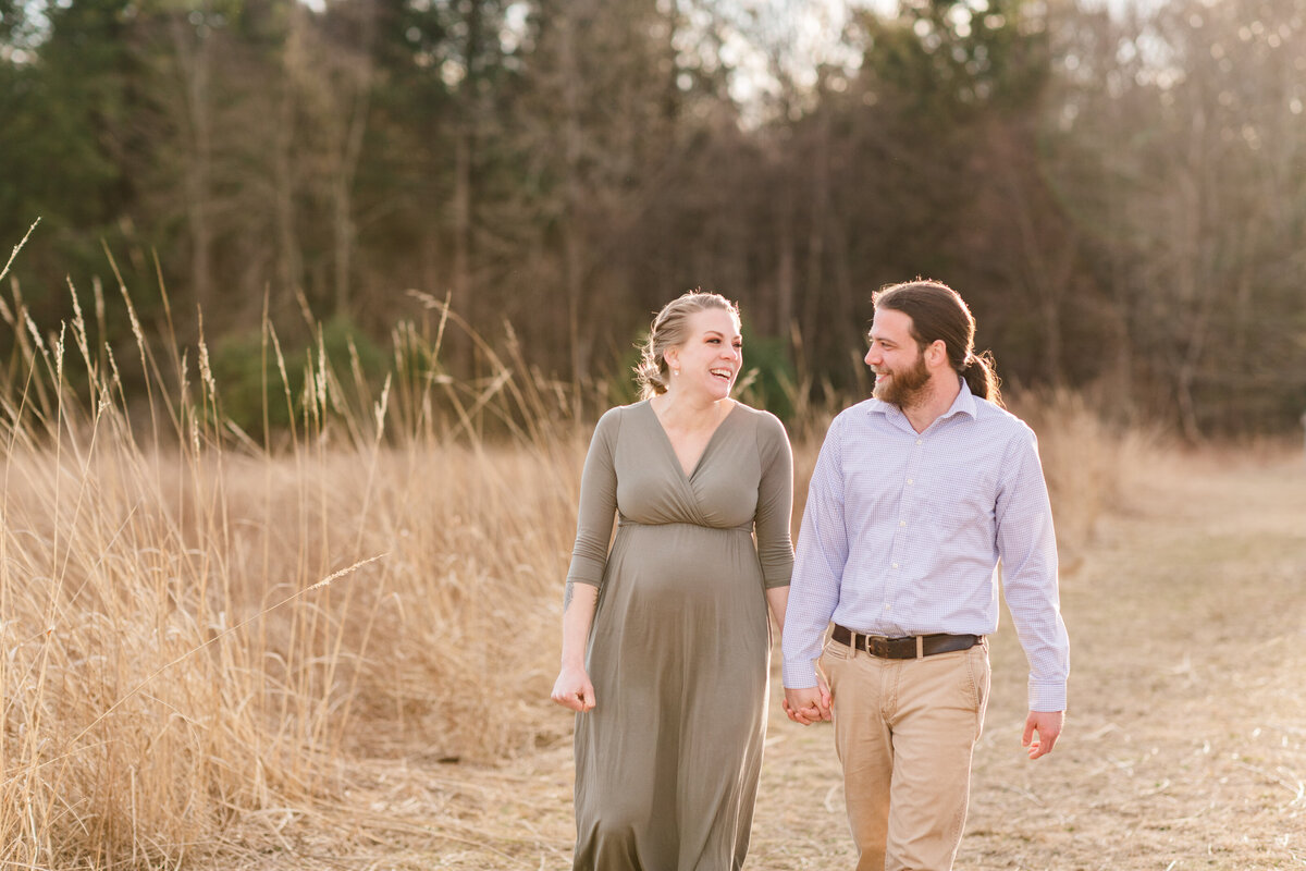 maternity couple fun outdoor fall