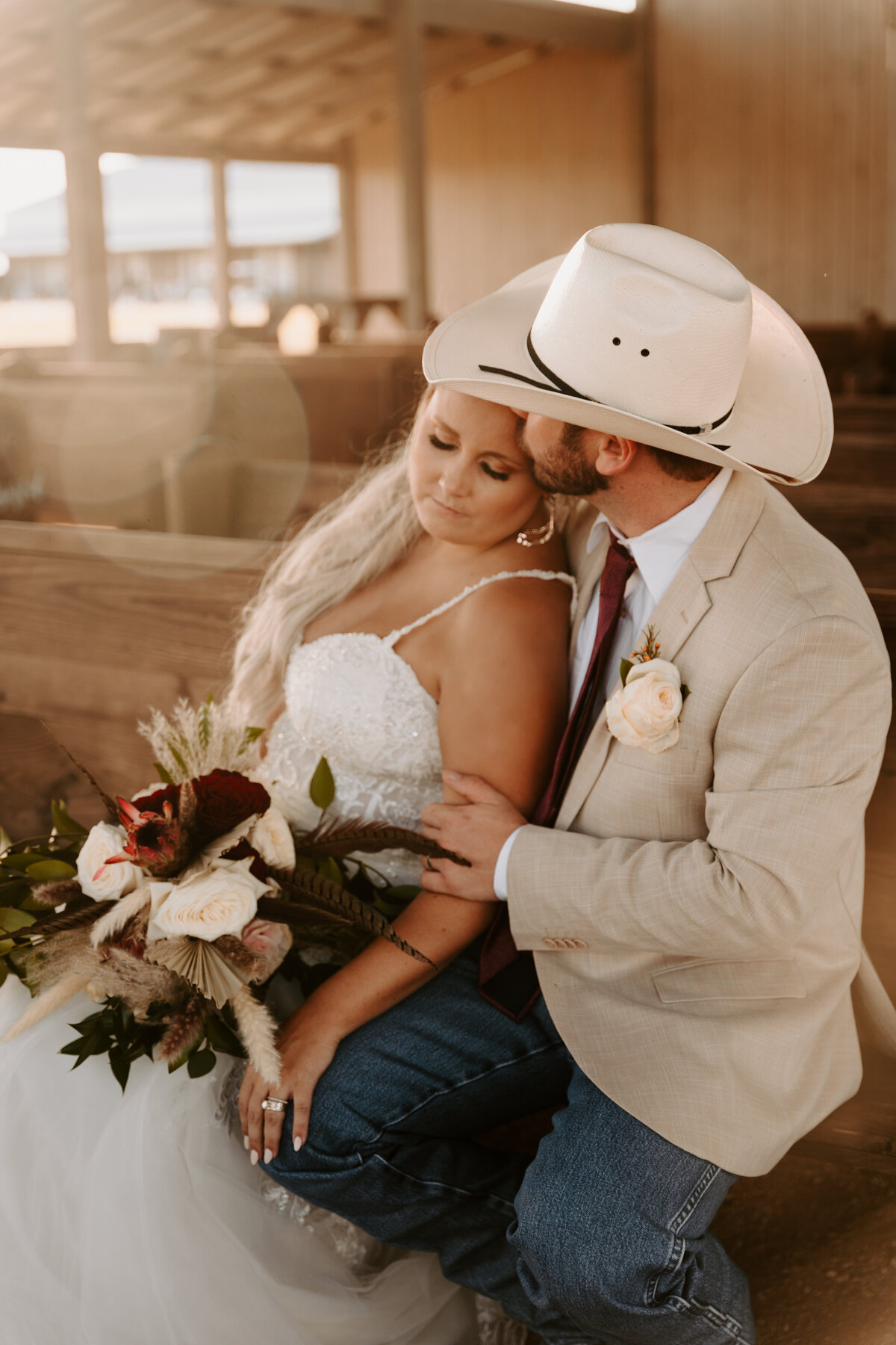 bride and groom sitting in chapel
