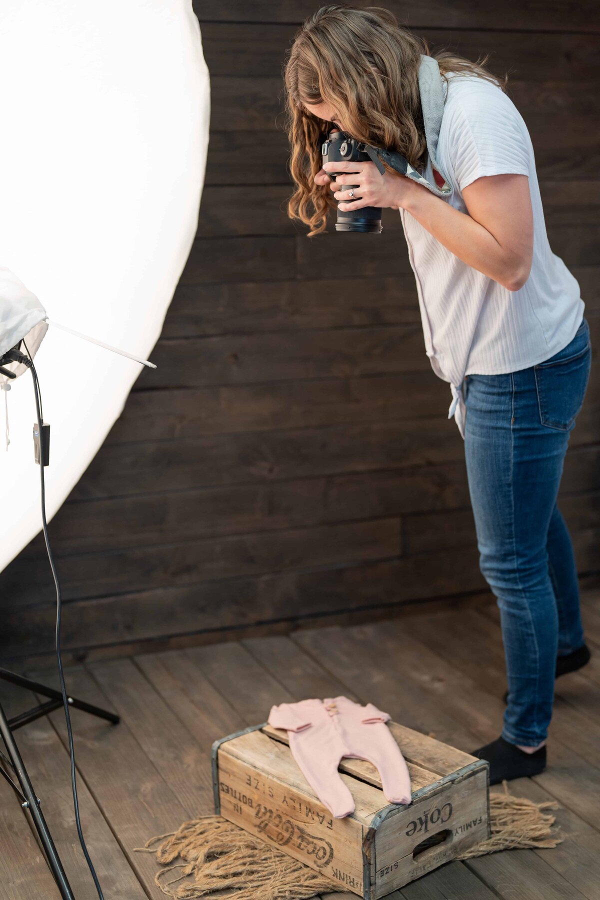 Woman photographer doing product photos