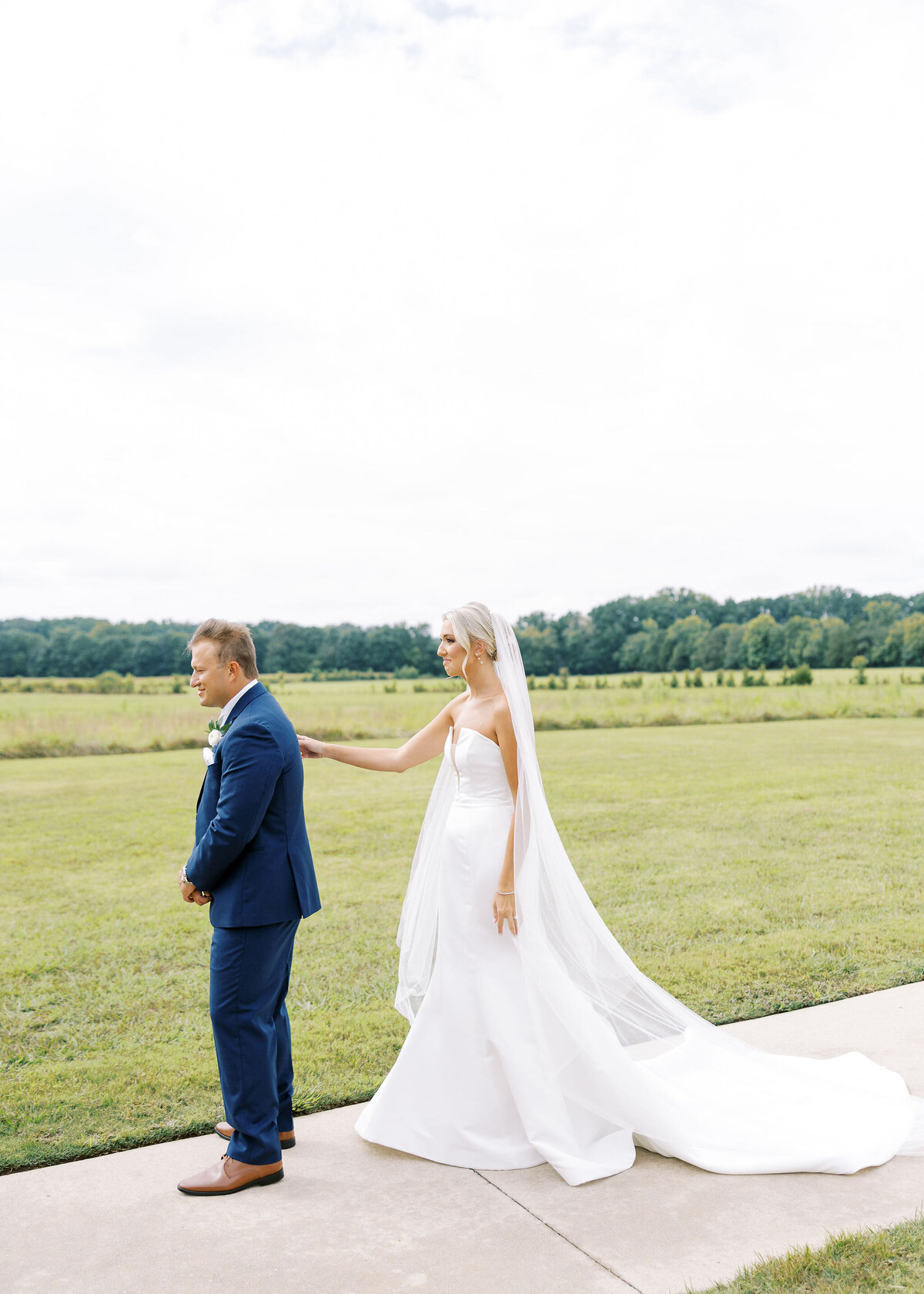 a bride surprising her groom on their wedding day