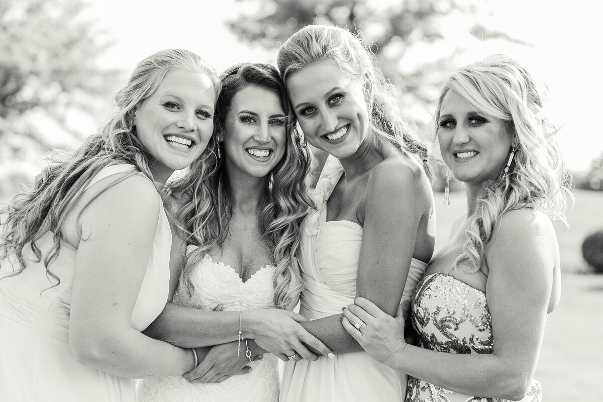 njeri-bishota-lauren-ashley-bride-bridesmaids-smiling-black-and-white