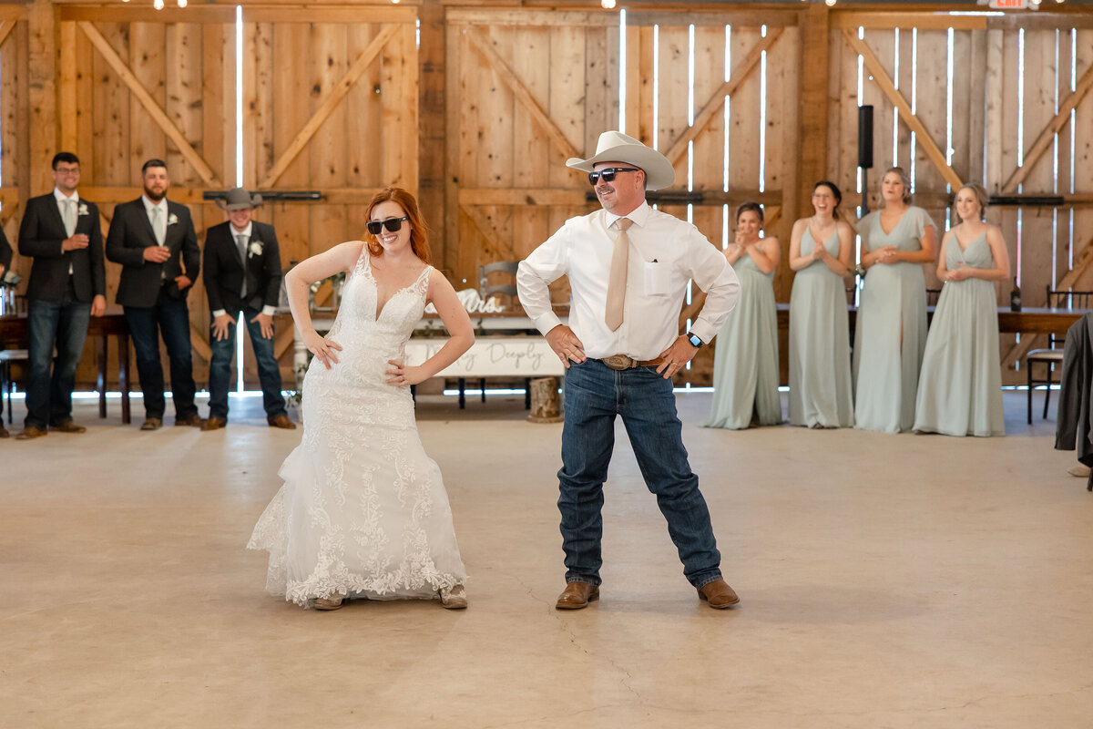 bride and father wear sunglasses and dance synchronized  choreographed dance at wedding in Boerne Texas