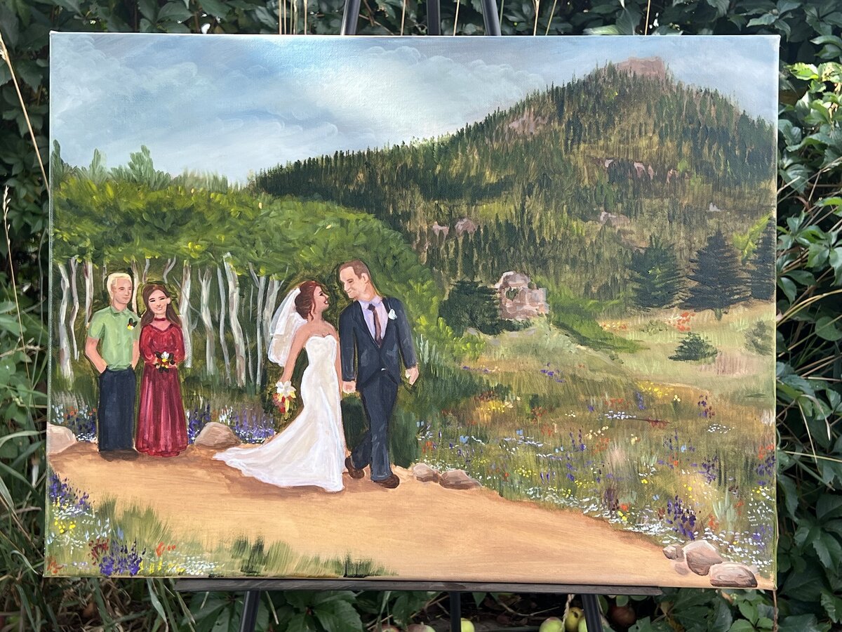 A couple takes a newlywed hike live wedding painting