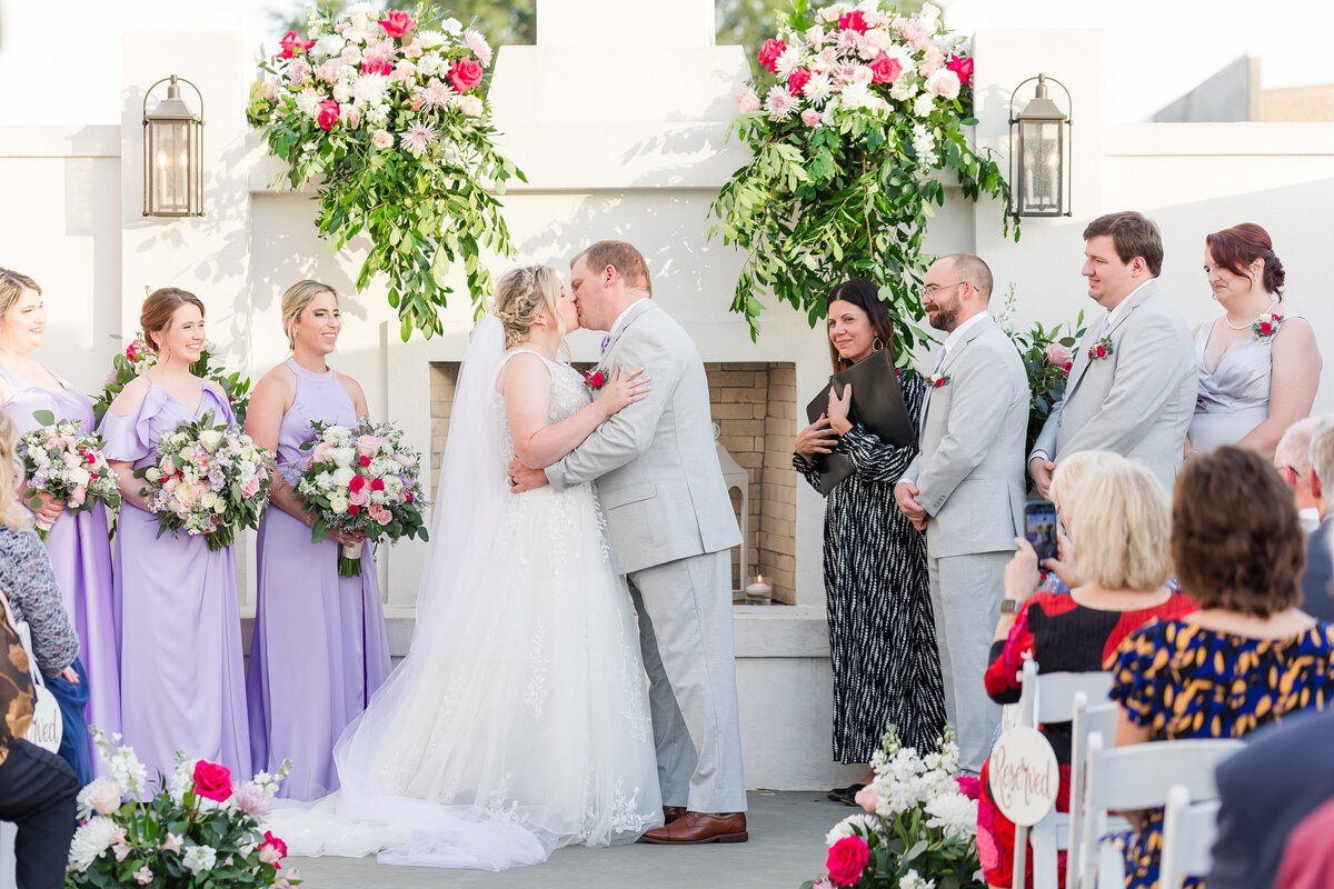 bride and groom first kiss at the moore in new orleans