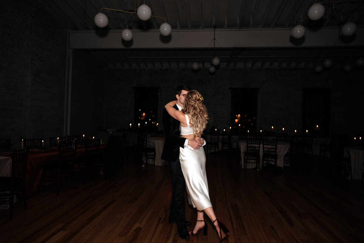 couple dancing alone at the end of a wedding