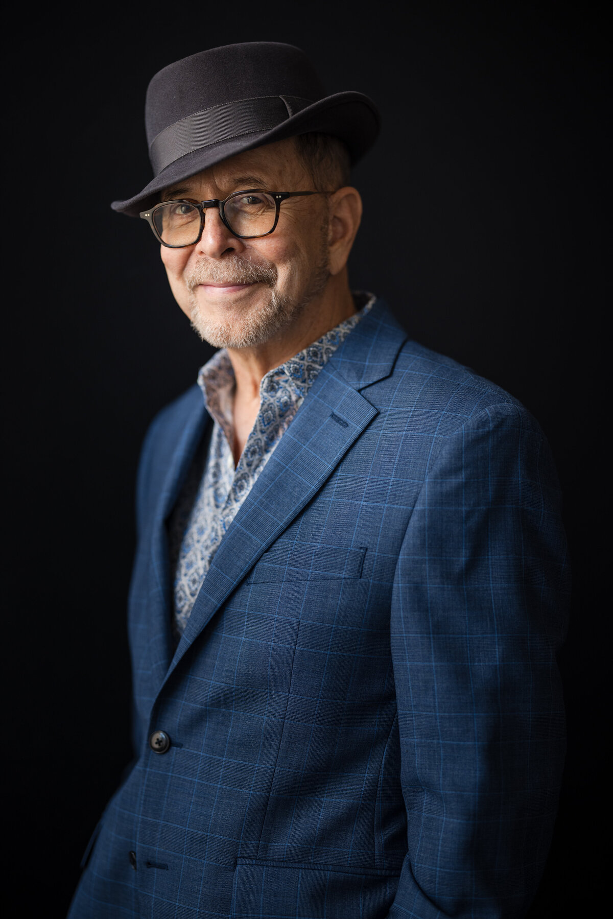 This photo was taken by a NYC studio photographer specializing in bold color portraits of an author for his book jacket photo.