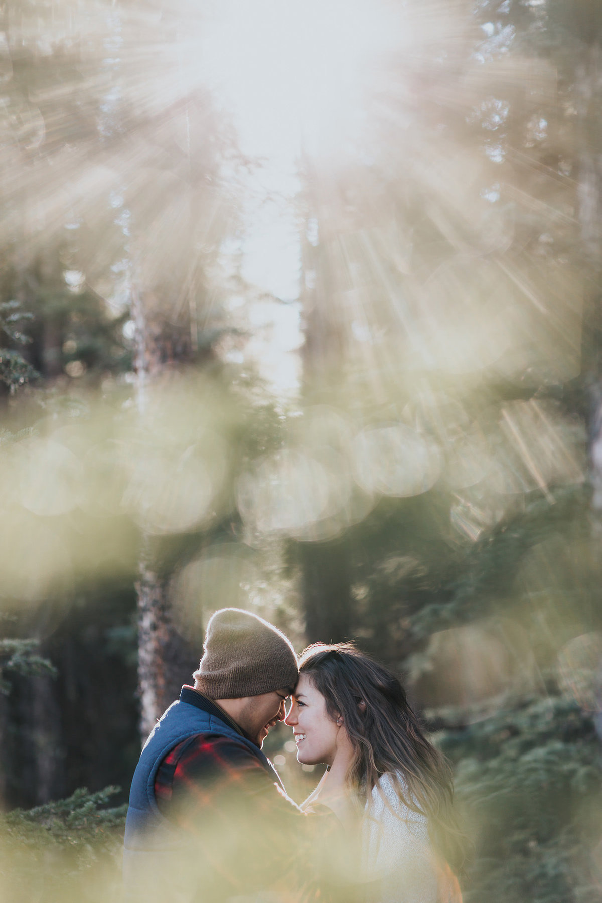 backlit sunlight glow banff engagement session couples photography