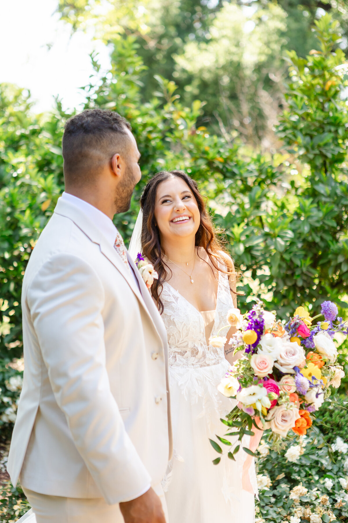 Couples smiling in a beautiful garden