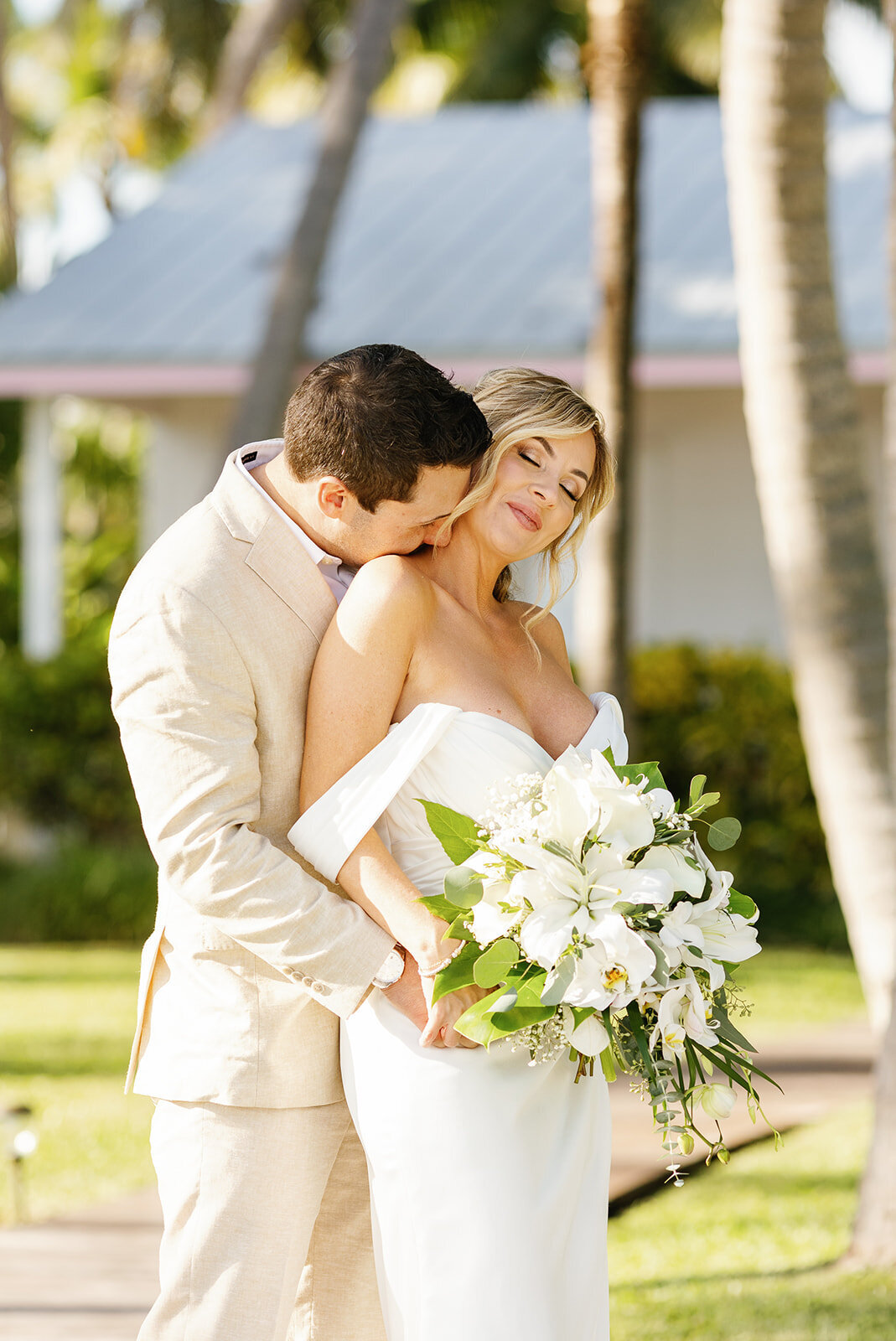 Austyn holds Monica close, capturing the romance of their Florida Keys destination wedding.