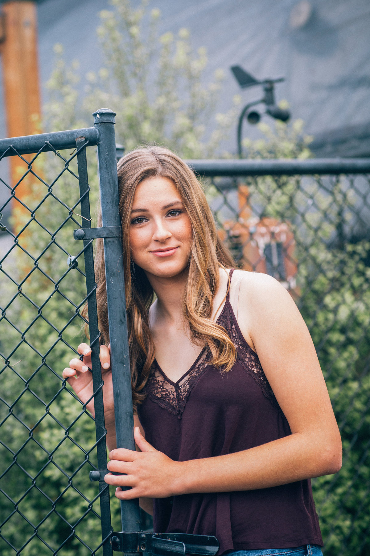 Lake Oswego Senior pictures at Park with Fence