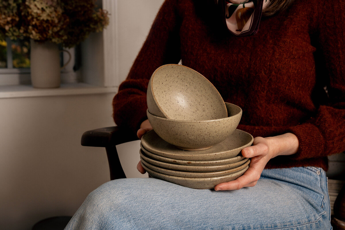 Greenville, SC product photography featuring pottery products being held by maker