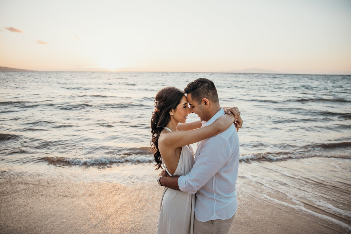 Maui Wedding Photographer captures couple touching foreheads during sunset portraits