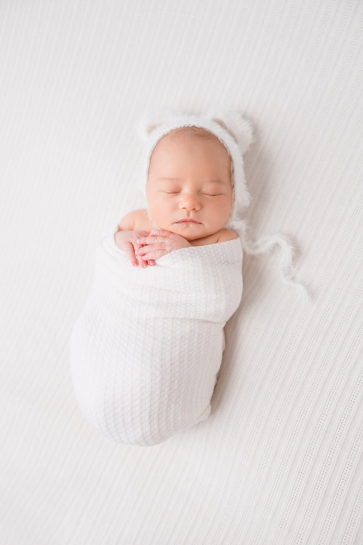 white newborn teddy bear