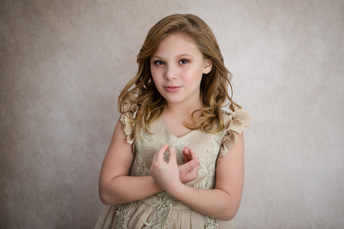 Little girl in gold dress in Buffalo, New York