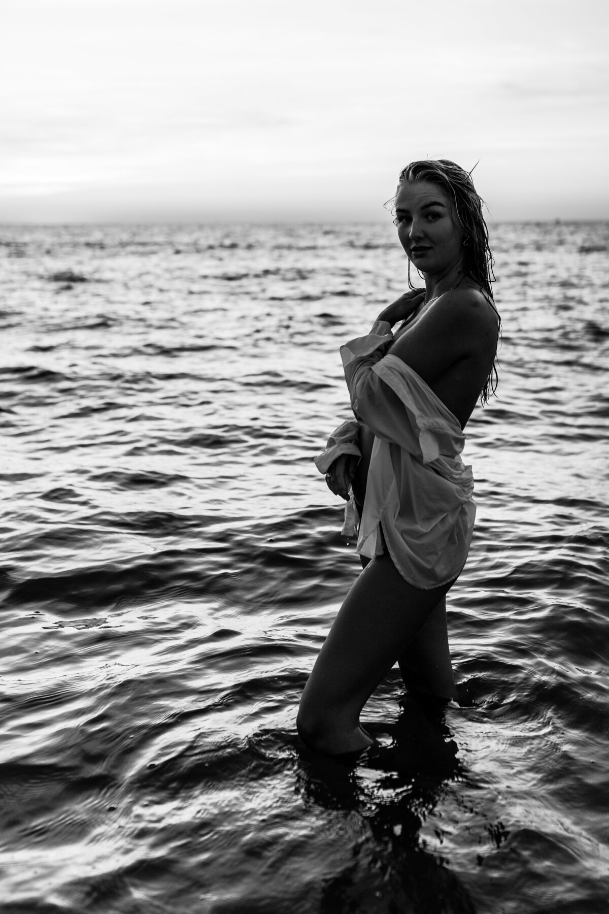 Sunlit beach empowerment session highlighting the human form and natural beauty.