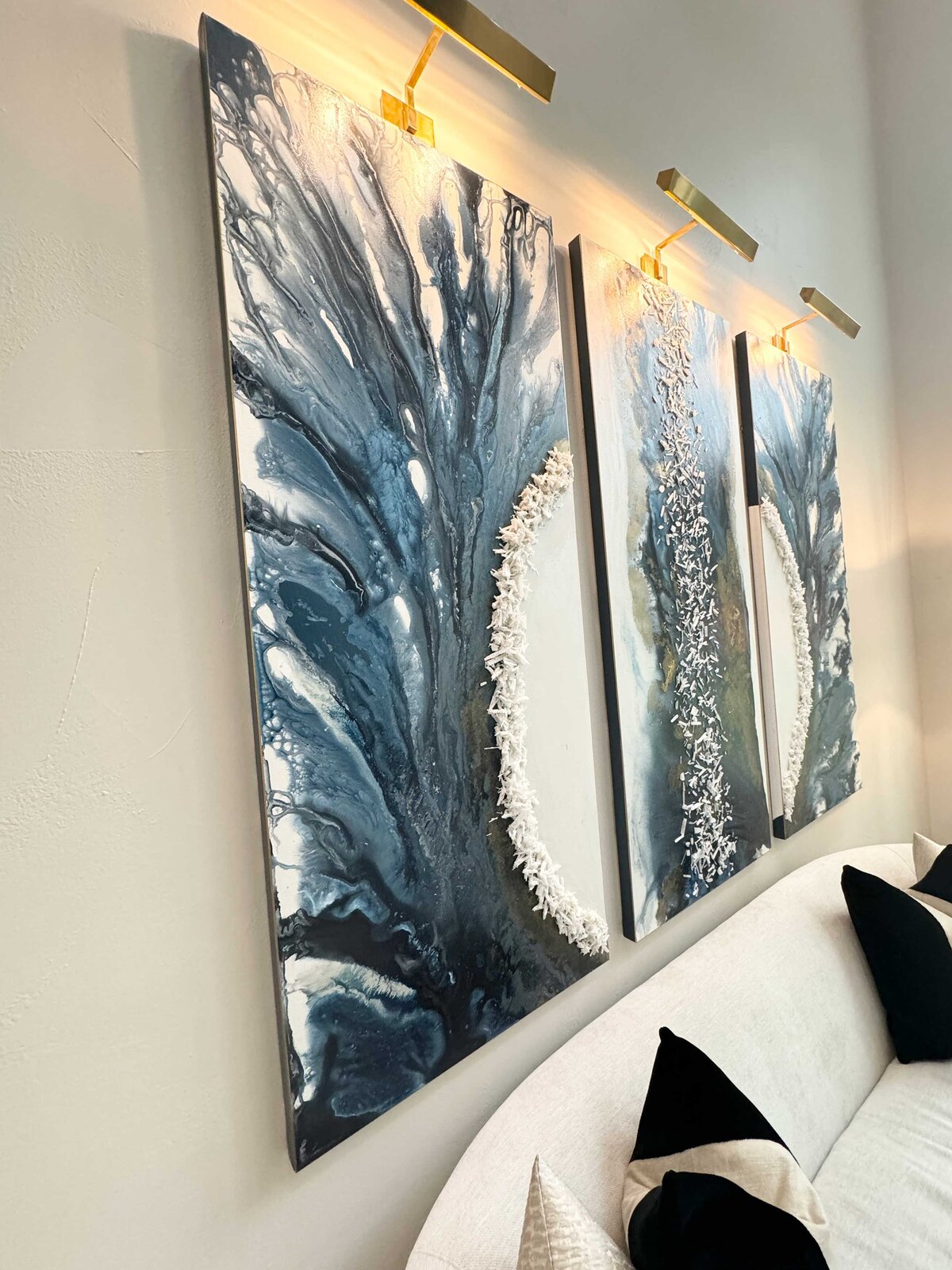 Modern home design and décor featuring a close-up of blue artwork, creating a vibrant and contemporary aesthetic in the living space.