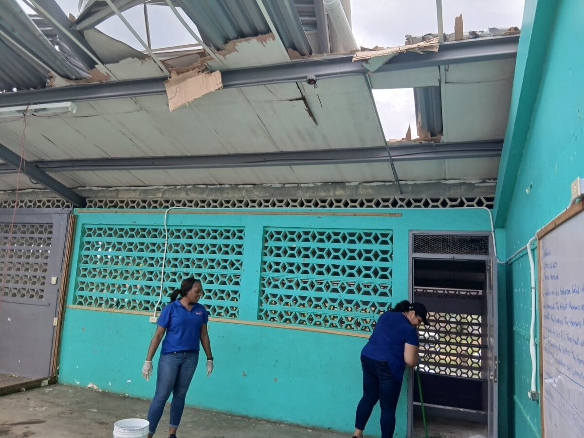 Exterior view of Barbary Hall Primary showing roof collapse and structural damage after Hurricane Melissa.