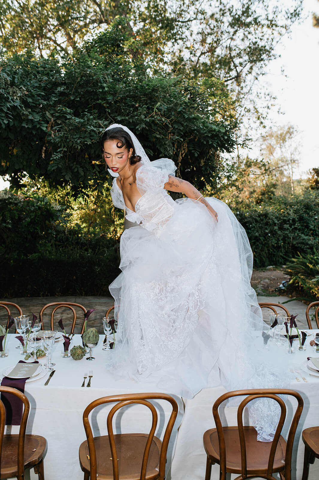 Bride-standing-on-table