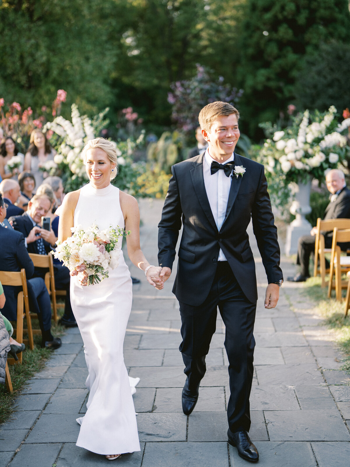 bride and groom ceremony recessional at cylburn arboretum in garden wedding baltimore