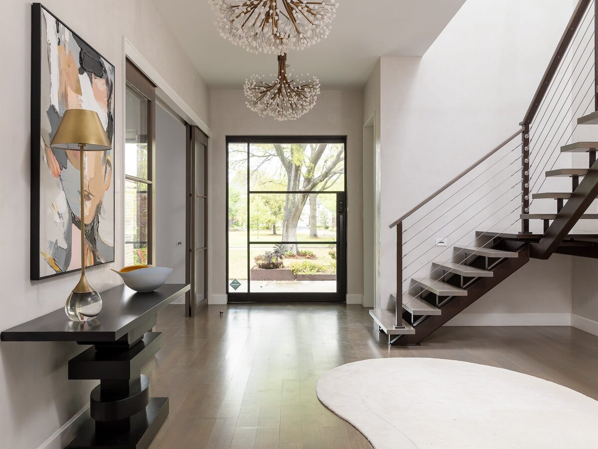 rebekah nicole interiors arbor entry way with open space and stairs