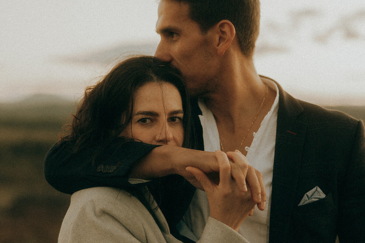 A A couple eloping in the mountains on the Sunshine Coast, enjoying a private and intimate elopement experience. eloping on the Sunshine Coast, captured in an adventurous and intimate photography session by the ocean