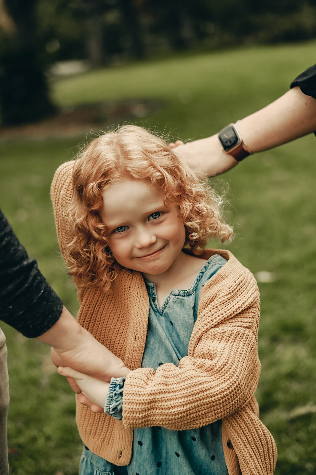 An artistic portrait from a fall family session at Washington Park in Denver, Colorado. Capturing candid moments with your family