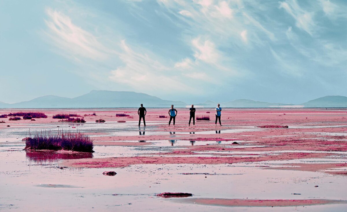 Music Group Portrait Hedley blue sky pink beach