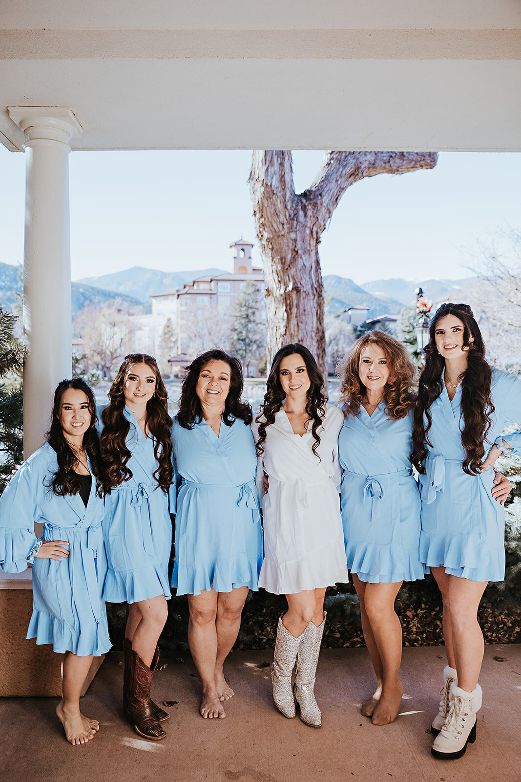 Bridesmaid PJ pictures in white and light blue robes.