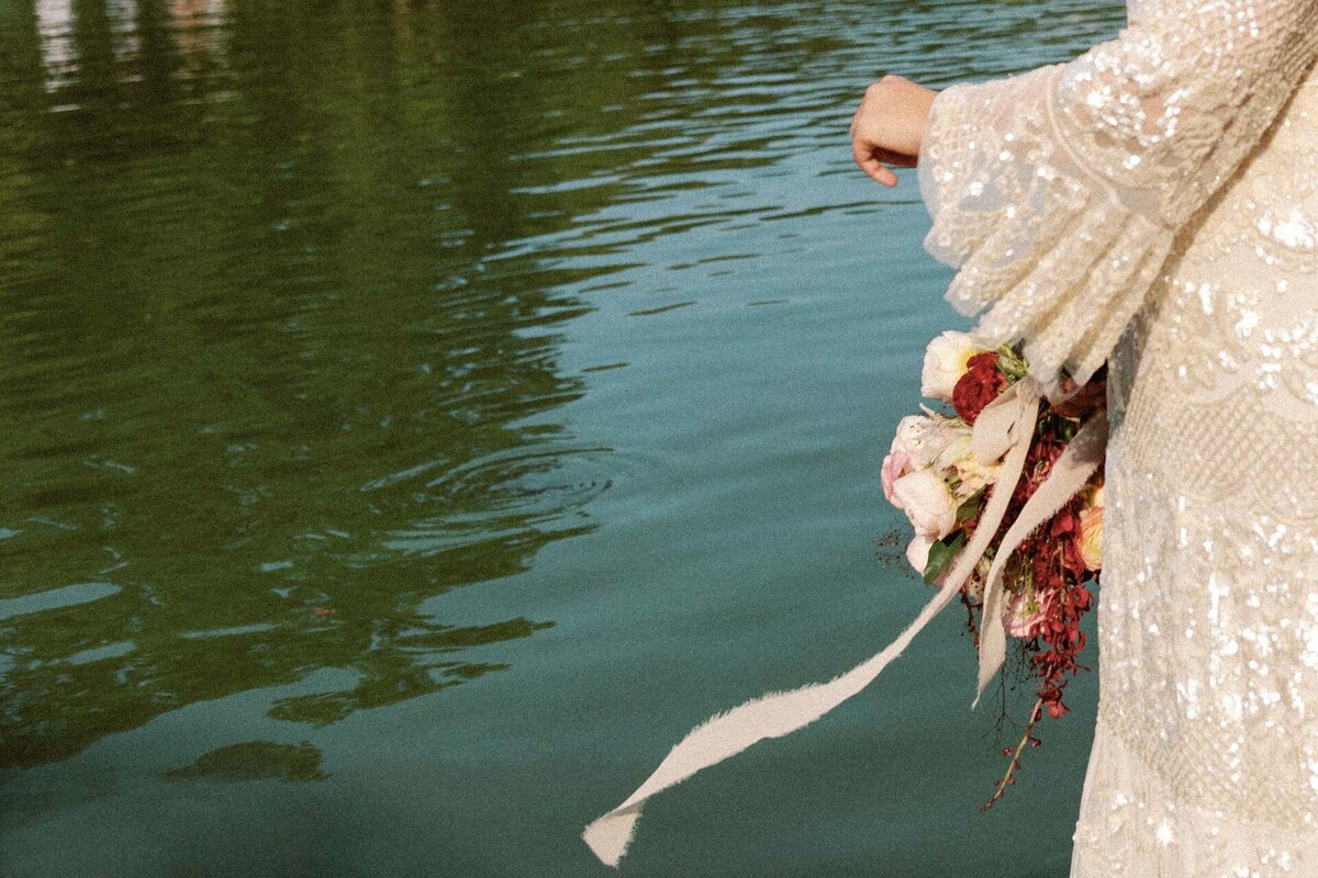 NYC central park elopement along the lake with bloom bloom bouquet and sequined dress