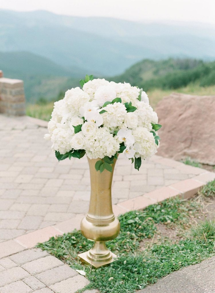 Custom wedding florals at an outdoor mountain venue in Vail Colorado