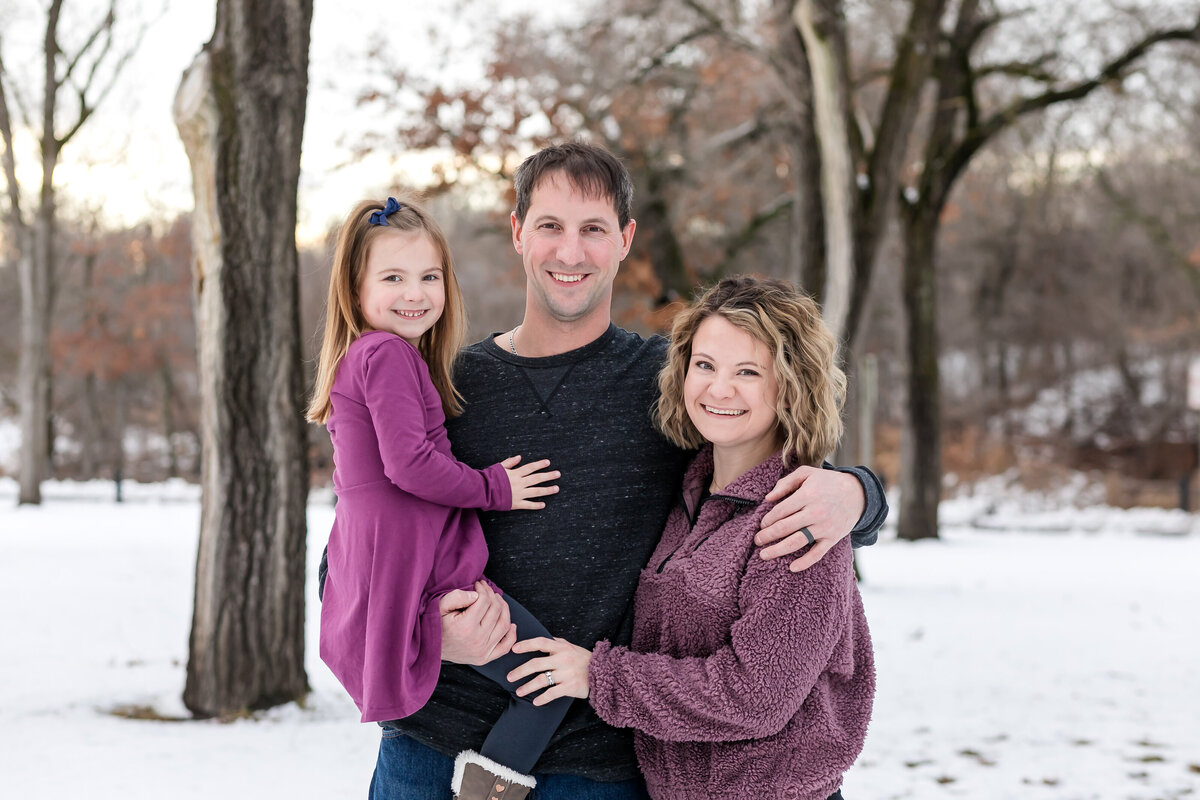 winter family photo west salem wisconsin mom dad and little girl