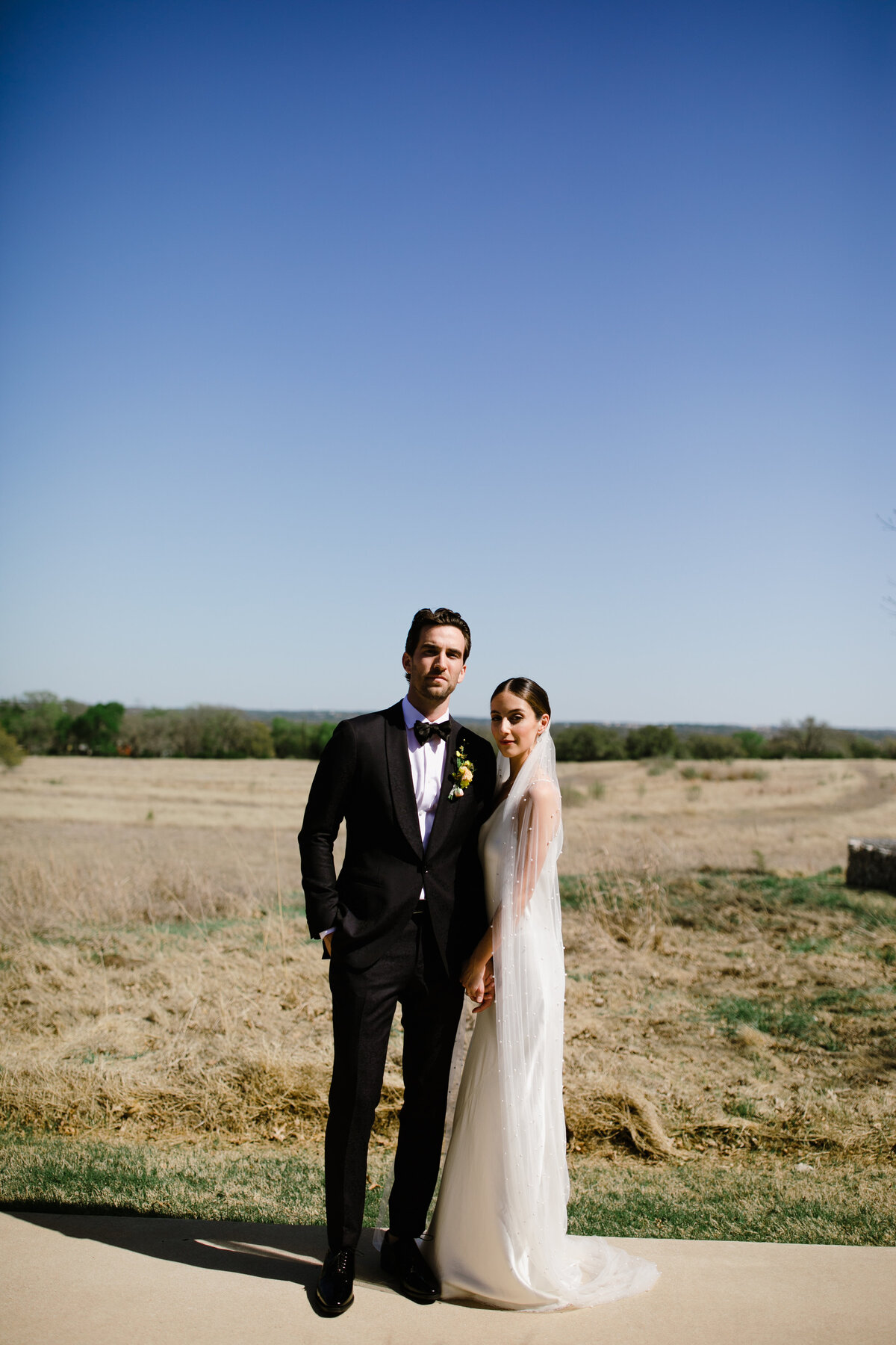 Bride and groom portraits in the grounds of Prospect House, Austin