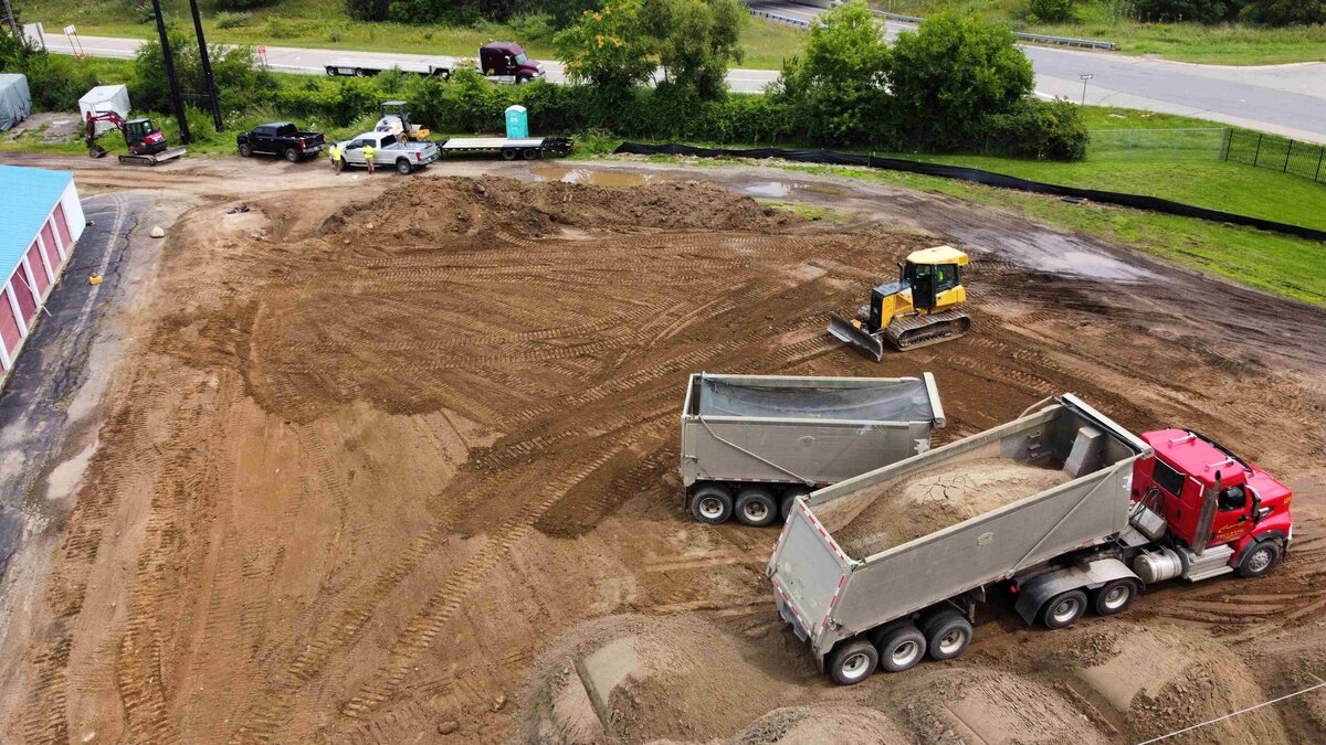 storage-facility-site-development-highland-services-dump-truck