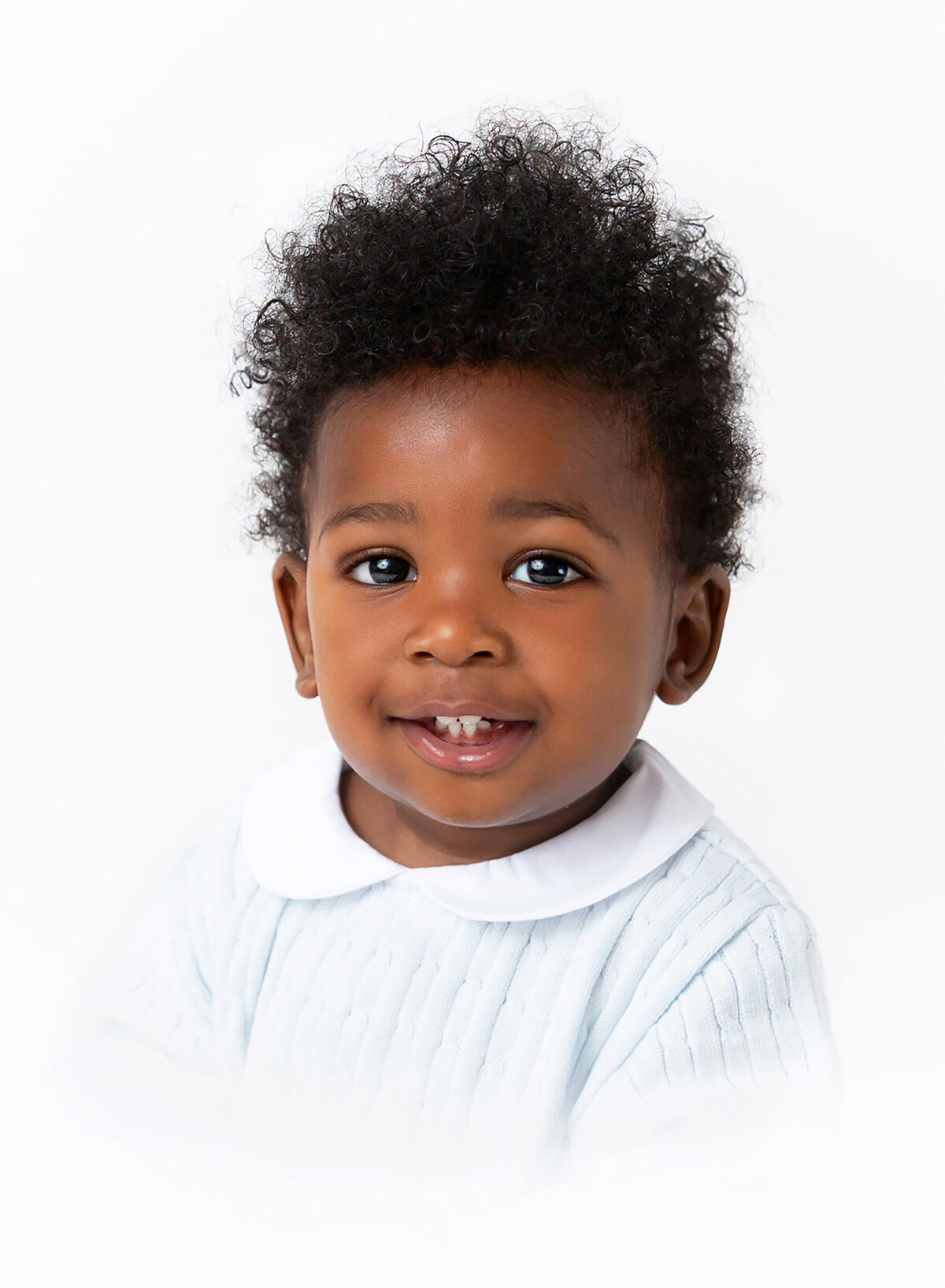 Heirloom baby portraits done by NYC baby photographer baby boy at his 1st birthday photoshoot