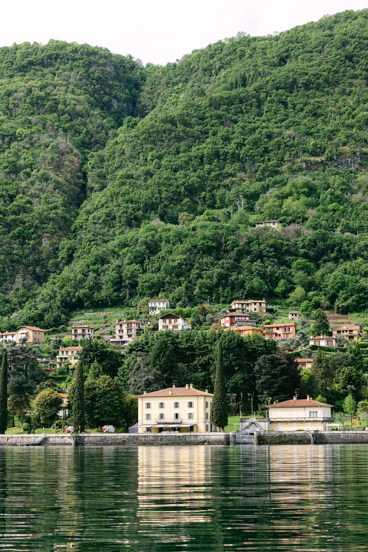 A wedding day drone photo of villa aura del lago on lake como in Italy