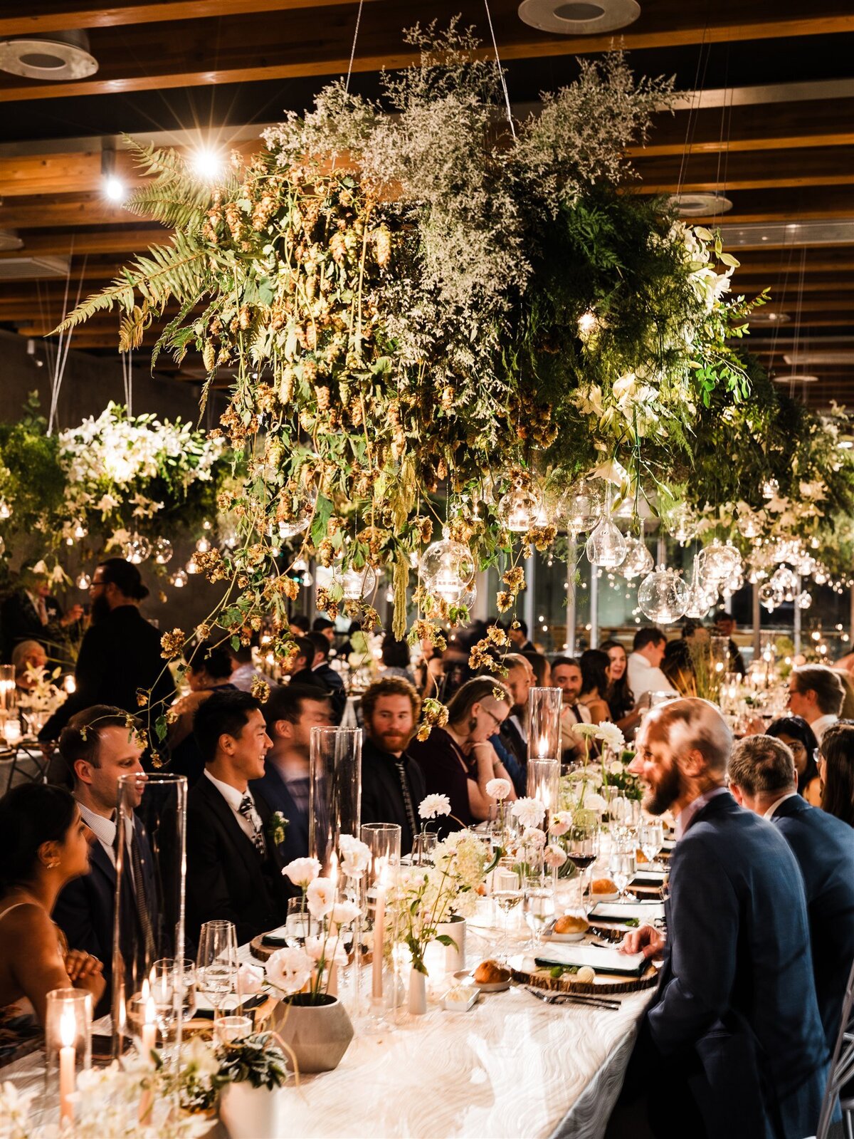 Dramatic-Ceiling-Greenery-Candle-Light-Wedding-Flora-Nova-Design-Seattle-00090