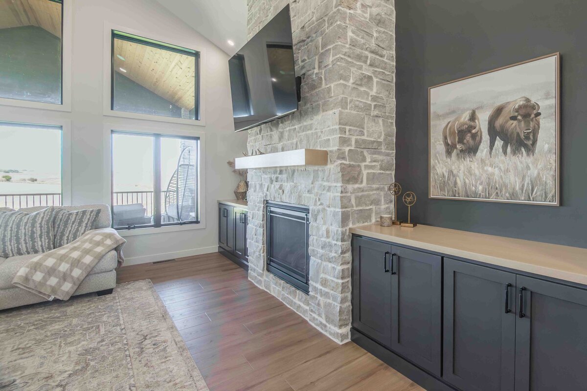 fireplace and black wood cabinets