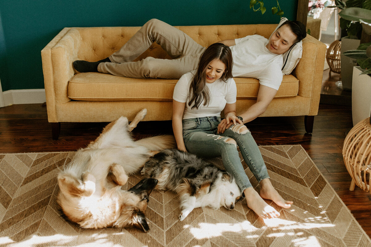 couple with dog on the couch