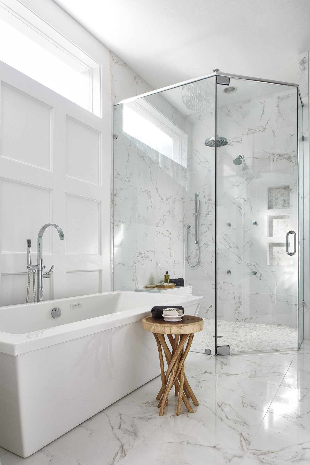 Elegant White Master Bath with Wooden Wine Stool