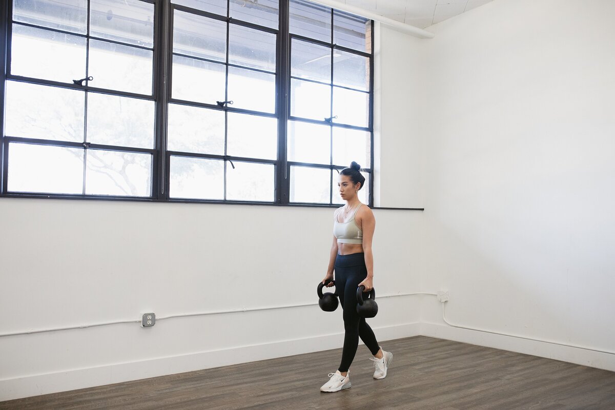 personal trainer demonstrating proper form